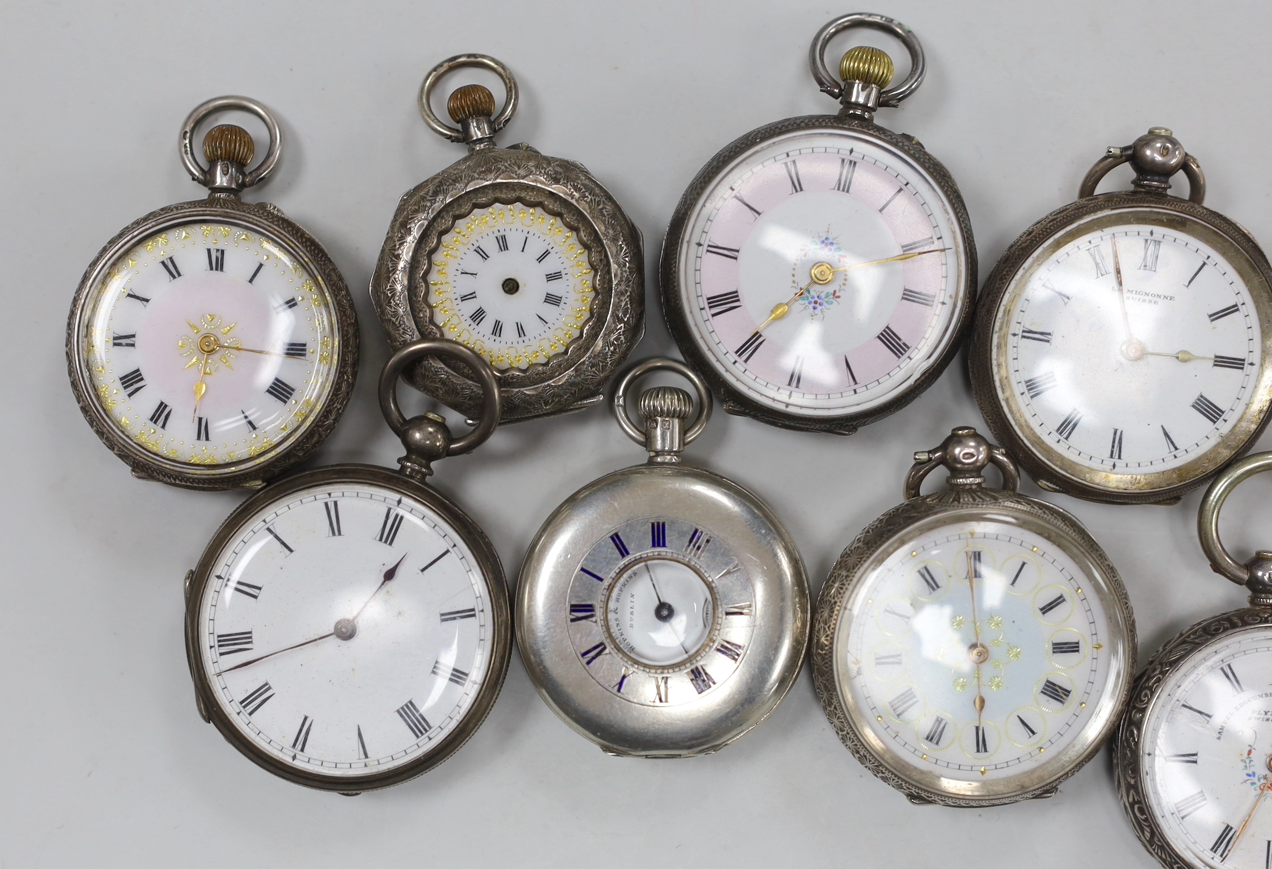 Twelve assorted mainly early 20th century silver or white metal fob watches, including enamelled and half hunter retailed by Hopkins & Hopkins of Dublin.